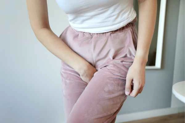 older woman running to the toilet because of urinary incontinence Sparkhill